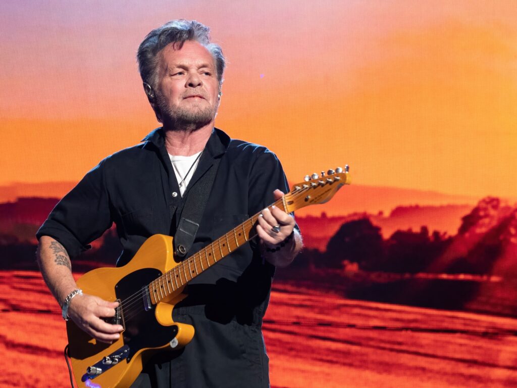 US musician John Mellencamp performs during the Farm Aid Music Festival at the Coastal Credit Union Music Park on September 24, 2022 in Raleigh, North Carolina. (Photo by SUZANNE CORDEIRO / AFP) (Photo by SUZANNE CORDEIRO/AFP via Getty Images)