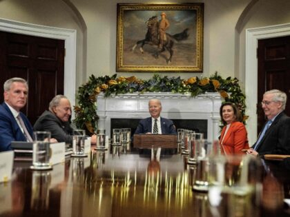 US President Joe Biden (C) meets with congressional leaders in the Roosevelt Room of the White House to discuss legislative priorities through the end of 2022, in Washington, DC, on November 29, 2022. - Left to right are House Minority Leader Kevin McCarthy, Senate Majority Leader Chuck Schumer, Speaker of …