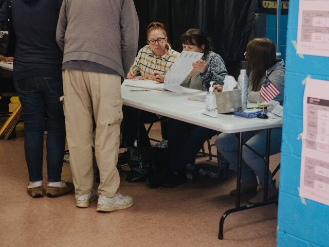 Voters and election officials at a polling location in Philadelphia, Pennsylvania, US, on