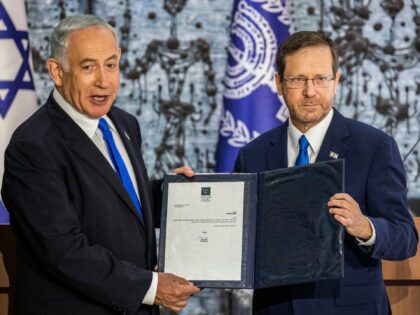 13 November 2022, Israel, Jerusalem: Likud leader and former Israeli prime minister Benjamin Netanyahu (L) receives mandate from Israeli President Isaac Herzog to form a government at the President's Residence. Photo: Ilia Yefimovich/dpa (Photo by Ilia Yefimovich/picture alliance via Getty Images)