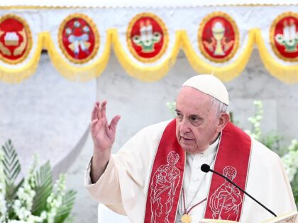 Pope Francis addresses the attendees at the Sacred Heart church in the Bahraini capital Ma