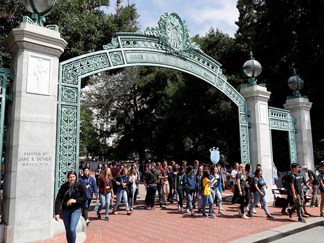 Students walk on the University of California, Berkeley campus in Berkeley, Calif., on Aug