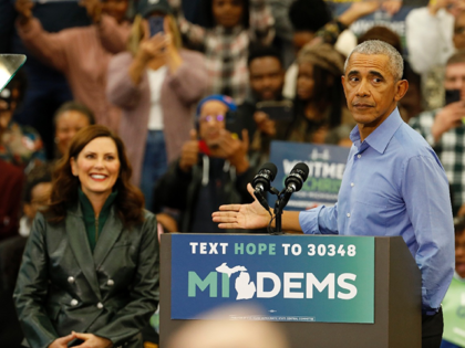 Former US President Barack Obama campaigns for Michigan Governor Gretchen Whitmer (L) duri