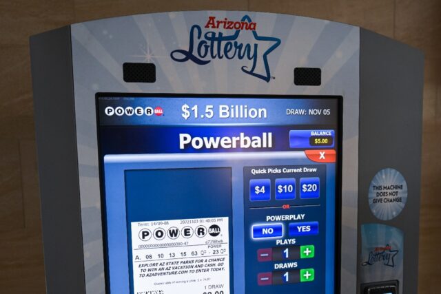 An Arizona Lottery kiosk displays lottery tickets ahead of a PowerBall $1.5 Billon jackpot