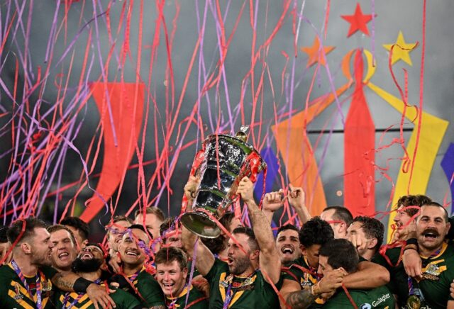 Australia celebrate their third straight title