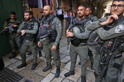 Israeli police deploy to the alleyway in Jerusalem's Old City where a man was shot dead af
