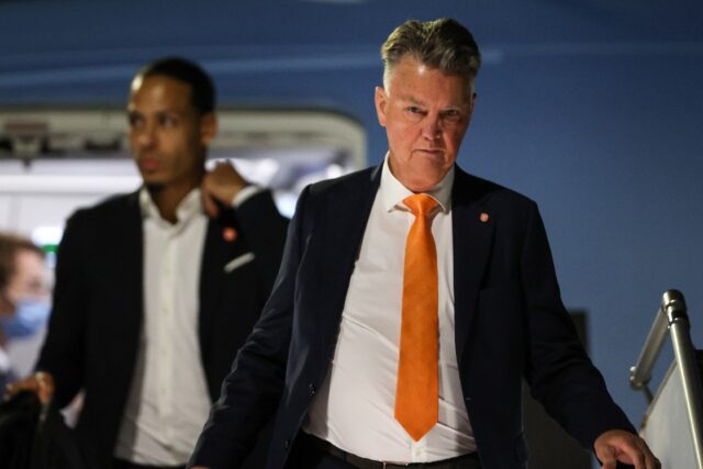 Netherlands coach Louis Van Gaal (R) and defender Virgil van Dijk arriving in Doha on Tues