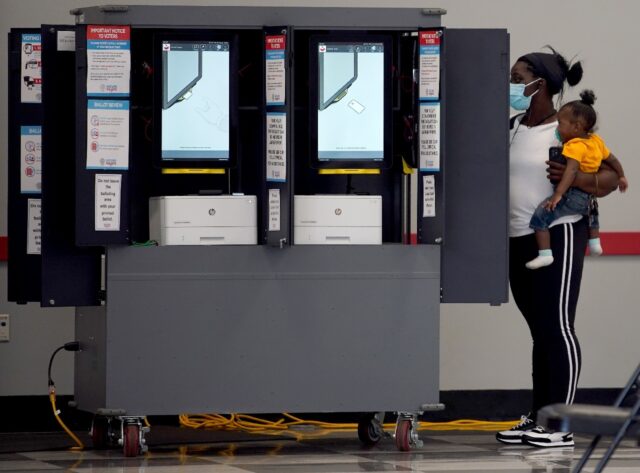 A voter casts her ballot during the US midterm election in Atlanta, Georgia, on November 8