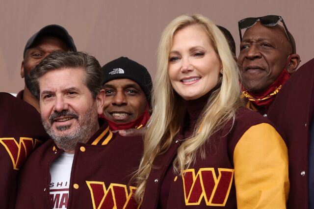 Washington Commanders team owners Dan Snyder (L) and his wife Tanya are exploring options