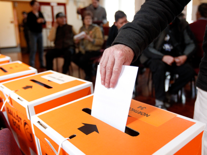 A vote is cast in Auckland, New Zealand, during a general election on Sept. 3, 2014. A lob