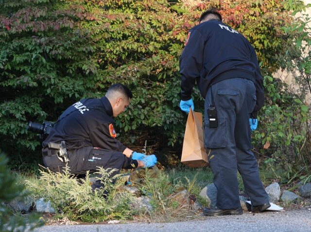 Shirley, N.Y.: Suffolk County Police Crime Scene Investigators collect evidence after a shooting near Congressman Lee Zeldin's home on St. George Drive in Shirley, New York, on October 9, 2022. (Photo by James Carbone/Newsday RM via Getty Images)