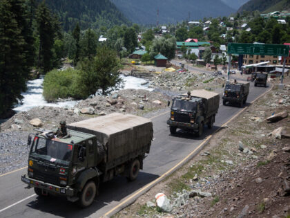 An Indian army convoy moves on the Srinagar- Ladakh highway at Gagangeer, north-east of Srinagar, India, Wednesday, June 17, 2020. Indian security forces said neither side fired any shots in the clash in the Ladakh region late Monday that was the first deadly confrontation on the disputed border between India …