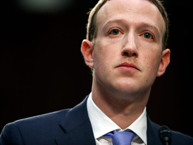 FILE- In this April 10, 2018, file photo, Facebook CEO Mark Zuckerberg testifies before a joint hearing of the Commerce and Judiciary Committees on Capitol Hill in Washington. Last spring, as false claims about vaccine safety threatened to undermine the world's response to COVID-19, researchers at Facebook wrote that they …