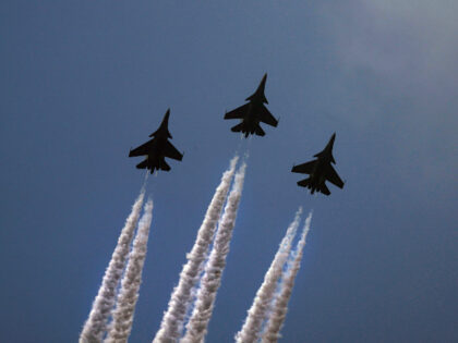 Indian Air Force three Su 30 MKI fly in a Trishul formation above the ceremonial Rajpath b