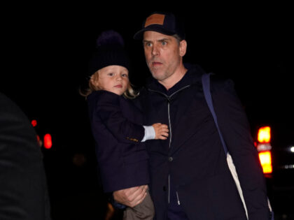 Hunter Biden and his son Beau Biden, President Joe Biden's grandson, arrive with the president and first lady Jill Biden at Nantucket Airport in Nantucket, Mass., Tuesday, Nov. 22, 2022. The Baden's are spending the Thanksgiving Day holiday in Nantucket with their family. (AP Photo/Susan Walsh)