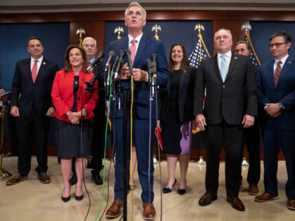 FILE - House Minority Leader Kevin McCarthy, of Calif., speaks during a news conference with members of the House Republican leadership, Nov. 15, 2022, after voting on top House Republican leadership positions, on Capitol Hill in Washington. Rep. Elise Stefanik, R-N.Y., and Rep. Steve Scalise, R-La., are at right. (AP …