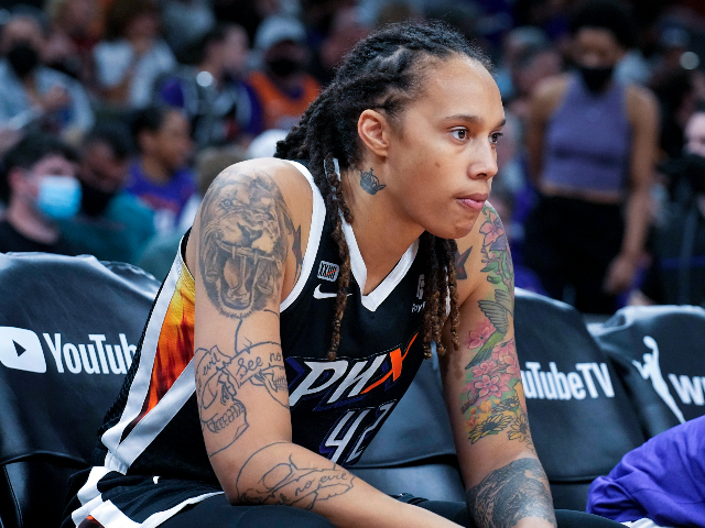 FILE - Phoenix Mercury center Brittney Griner sits during the first half of Game 2 of basketball's WNBA Finals against the Chicago Sky, Wednesday, Oct. 13, 2021, in Phoenix. Russia has freed WNBA star Brittney Griner in a dramatic high-level prisoner exchange, with the U.S. releasing notorious Russian arms dealer Viktor Bout. (AP Photo/Rick Scuteri, File)