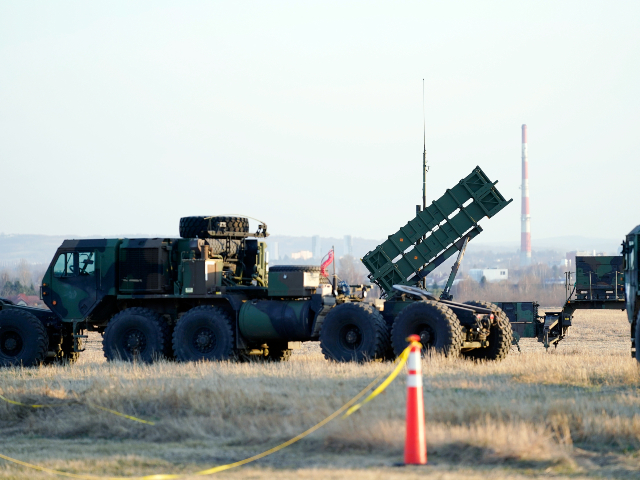 FILE - Patriot missiles are seen at the Rzeszow-Jasionka Airport, March 25, 2022, in Jasionka, Poland. The U.S. will send $1.8 billion in military aid to Ukraine in a massive package that will for the first time include a Patriot missile battery and precision guided bombs for their fighter jets, U.S. officials said Tuesday, Dec. 20, 2022, as the Biden administration prepares to welcome Ukrainian President Volodymyr Zelenskyy to Washington. (AP Photo/Evan Vucci, File)
