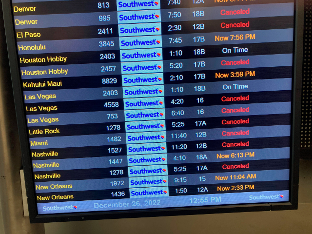 A flight board shows canceled flights at the Southwest Airlines terminal at Los Angeles International Airport, Monday, Dec. 26, 2022, in Los Angeles. (AP Photo/Eugene Garcia)