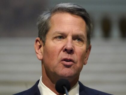 In this Dec. 8, 2020, file photo, Georgia Gov. Brian Kemp speaks to reporters at the Capit