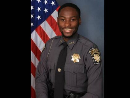 Off-duty Fulton County Deputy James Thomas was shot and killed early Thursday while driving on Bolton Road in the Riverside neighborhood of Atlanta.