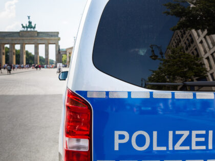 Police car in front of the Brandenburg Gate