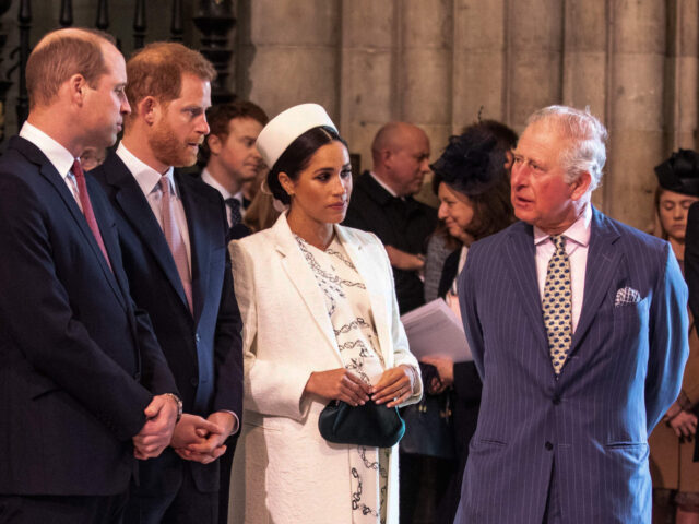 Britain's Meghan, Duchess of Sussex (2R) talks with Britain's Prince Charles, Prince of Wa