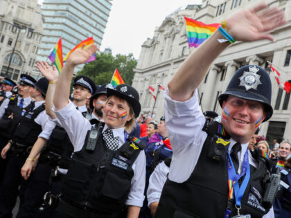 LONDON, ENGLAND - JULY 06: Police officers join the parade during Pride in London 2019 on July 06, 2019 in London, England. (Photo by Tristan Fewings/Getty Images for Pride in London)