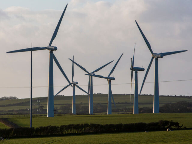 Wind turbines on Llyn Alaw Wind Farm in full electricity production during the tail end of