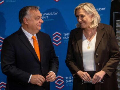 Leader of French far-right party Rassemblement National (RN) and candidate for the French presidential elections Marine Le Pen (R) and Hungarian Prime Minister Viktor Orban (L) pose before the meeting of Leaders of European conservative and right-wing parties 'The Warsaw Summit' in Warsaw, Poland, on December 4, 2021. (Photo by …