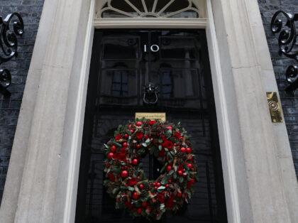 LONDON, ENGLAND - DECEMBER 11: A Christmas wreath on the door of number 10 Downing Street on December 11, 2021 in London, England. Number 10 has cancelled its Christmas party due to concerns about rising covid-19 cases. An inquiry is also underway into a gathering at Downing Street in December …