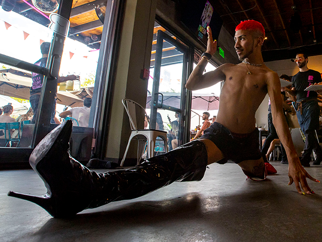 Drag queen assistant Jordy Hernandez performs for the halftime show during a Drag Brunch a