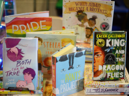BETHESDA, MD - MAY 21: Children books that are fighting for survival at public schools because of their LGBTQ content are displayed at the annual Pride Town Hall at Walter Johnson High School in Bethesda, MD, May 21, 2022, with students and their families, staff, youth service providers and community …