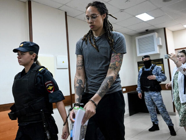 TOPSHOT - US Women National Basketball Association's (WNBA) basketball player Brittney Griner, who was detained at Moscow's Sheremetyevo airport and later charged with illegal possession of cannabis, leaves the courtroom before the court's final decision in Khimki outside Moscow, on August 4, 2022. - Russian prosecutors requested that US basketball …