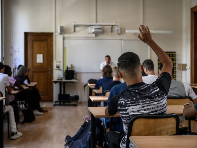 Pupils sit in a classroom on the first day of the new academic year in a Lyon highschool,