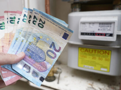 10 and 20 Euro notes in front of a gas meter. Finance Minister Paschal Donohoe prepares to