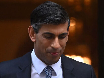 Britain's Prime Minister Rishi Sunak looks down as he leaves 10 Downing Street in central London on November 30, 2022 on his way to take part in the weekly session of Prime Minister's Questions (PMQs) in the House of Commons. (Photo by JUSTIN TALLIS / AFP) (Photo by JUSTIN TALLIS/AFP …