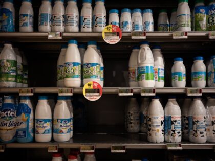 Milk bottles and out of stock products are seen in a supermarket in Bordeaux, southwestern France, on December 2, 2022. (Photo by Philippe LOPEZ / AFP) (Photo by PHILIPPE LOPEZ/AFP via Getty Images)