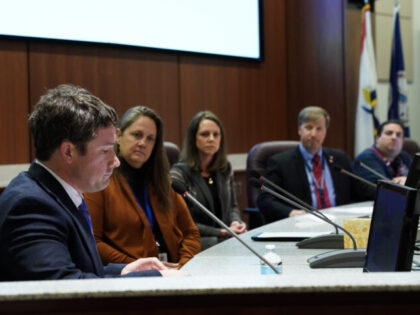 Ashburn, VA - December 8: Dr. Daniel Smith, L, takes his place on the board after being appointed interim superintendent of Loudoun County Public Schools at an emergency board meeting at LCPS Administrative Offices on December 8, 2022, in Ashburn, VA. The Loudoun County Public Schools board fired Superintendent Scott …