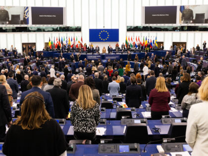14 December 2022, France, Straßburg: Members as well as visitors of the European Parliament commemorate the Ukrainian victims of Russia's war of aggression against Ukraine during a minute of silence at the Sakharov Prize ceremony, together with Ukrainian President Volodymyr Selenskyj, who was joined by video. Today, the European Parliament …