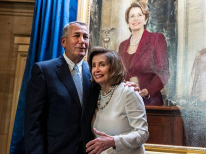 UNITED STATES - DECEMBER 14: Speaker of the House Nancy Pelosi, D-Calif., greets former Speaker John Boehner, R-Ohio, during a portrait unveiling ceremony for Pelosi in the U.S. Capitols Statuary Hall on Wednesday, December 14, 2022. Senate Majority Leader Charles Schumer, D-N.Y., appears at left. (Tom Williams/CQ-Roll Call, Inc via …