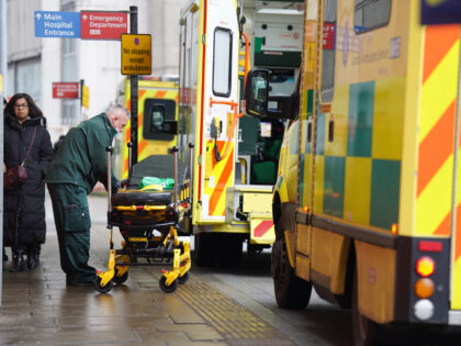 Ambulances outside the Royal London Hospital in east London. Ambulance staff in England and Wales walked out on Wednesday, following action by nurses on Tuesday, with the NHS braced for extra pressure as a knock-on effect of the industrial action. Picture date: Thursday December 22, 2022. (Photo by James Manning/PA …