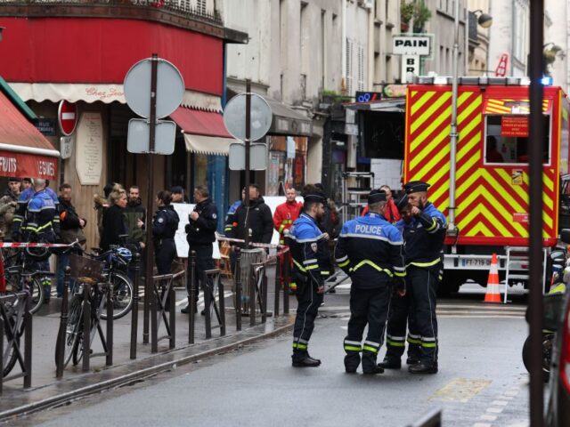 French security personnel secure the street after several shots were fired along rue d&#03