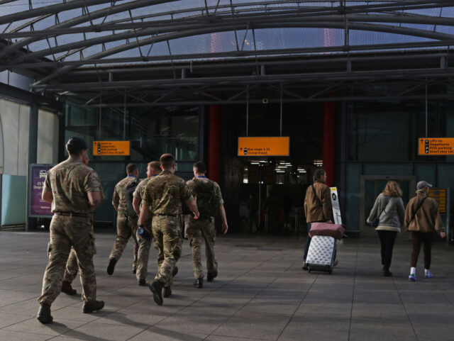 British Army soldiers arrive for border support work at Heathrow Airport Terminal 5 during