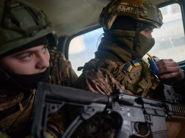 BAKHMUT, UKRAINE - DECEMBER 28: Soldiers of a Ukrainian intelligence battalion drive to th