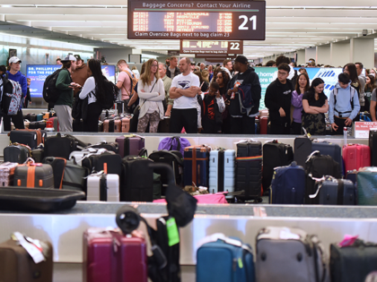 Unclaimed luggage piles up at baggage carousels during the busy Christmas holiday season at Orlando International Airport on December 28, 2022 in Orlando, Florida. The holiday travel period has been plagued by a winter storm and thousands of delayed and cancelled flights, the majority of which have occurred at Southwest …