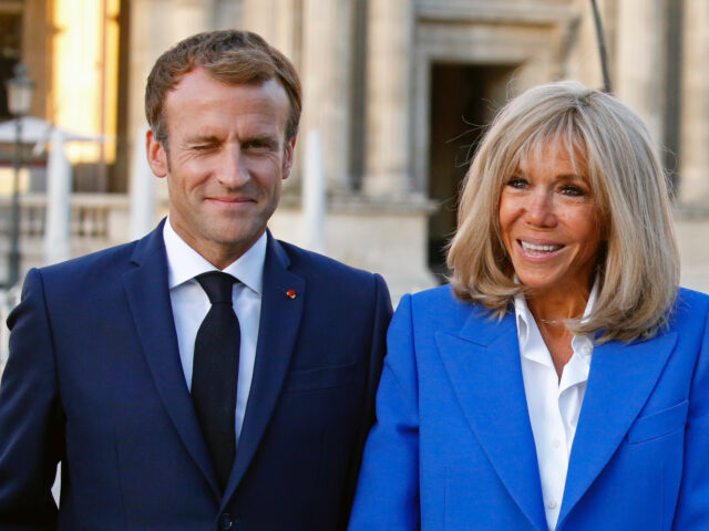 PARIS, FRANCE - SEPTEMBER 27: French President, Emmanuel Macron and his wife Brigitte Macon pose prior to the inauguration of the exhibition "Paris-Athens. Birth of Modern Greece "at the Louvre Museum, this inauguration will be followed by a working dinner at the Elysee Palace on September 27, 2021 in Paris …