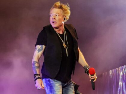 Axl Rose of Guns N' Roses performs onstage with Carrie Underwood during Day 2 of the 2022