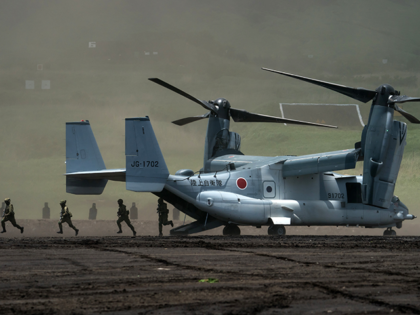 Members of the Japan Ground Self-Defense Force (JGSDF) disembark from a V-22 Osprey aircraft during a live fire exercise at East Fuji Maneuver Area on May 28, 2022 in Gotemba, Shizuoka, Japan. The annual live-fire drill takes place as Japanese Prime Minister Fumio Kishida pledged to boost defense spending after …