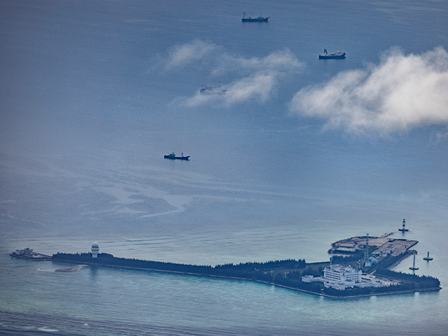 Buildings and structures are seen on the artificial island built by China in Gaven Reefs on October 25, 2022 in Spratly Islands, South China Sea. China has progressively asserted its claim of ownership over disputed islands in the South China Sea by artificially increasing the size of islands, creating new islands and building ports, military outposts and airstrips. The South China sea is an important trade route and is of significant interest as geopolitical tensions remain high in the region. (Photo by Ezra Acayan/Getty Images)